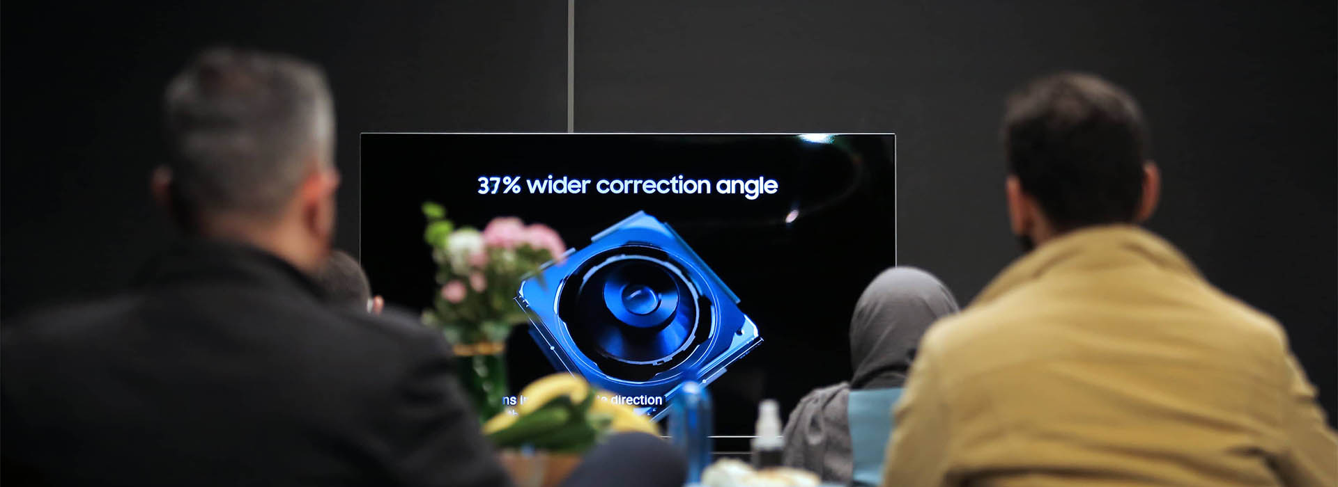 Attendees at Galaxy Unpacked 2022 in Netbina Studio watching the livestream on a Samsung screen