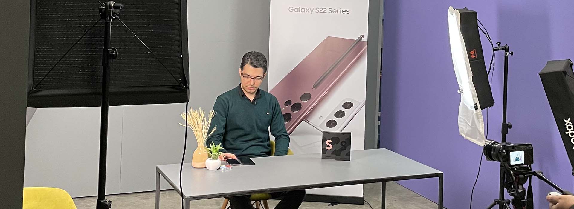 samsung-PR-event-s22-galaxy-content-production-zone A content producer seated at the content production zone at Samsung Galaxy S22 PR event working with the new device, being filmed